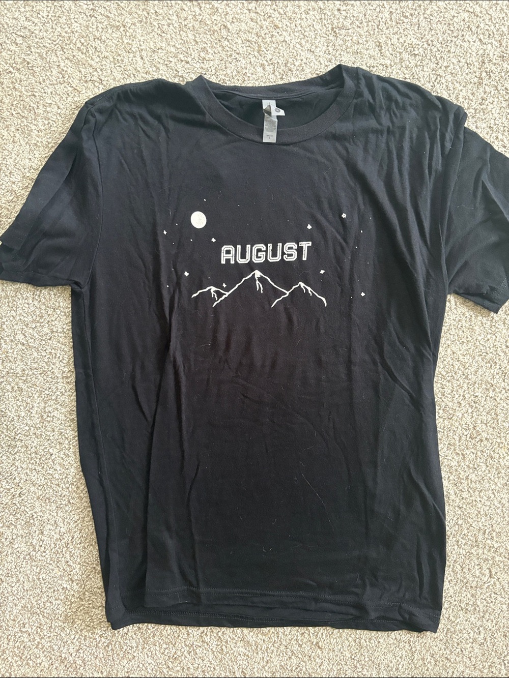 Black Tee with White 'AUGUST' Mountain Graphic